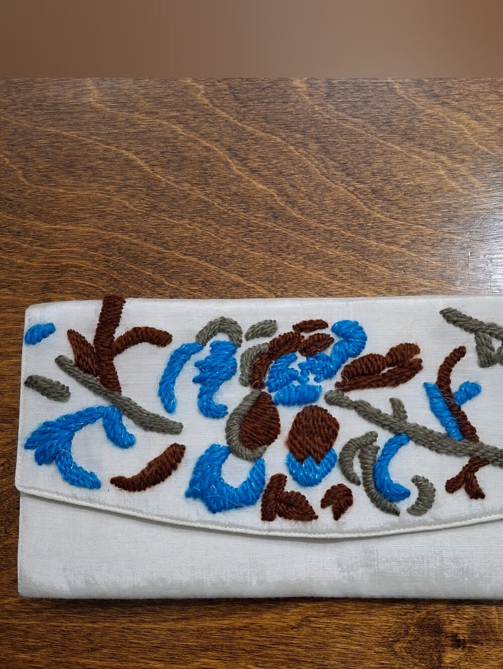 NWT Chan Luu Embroidered Cream Clutch with Blue and Brown Floral Motif